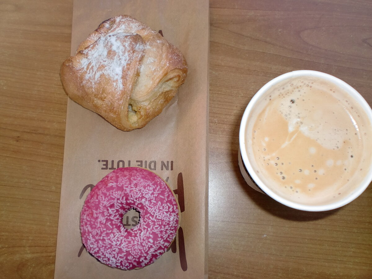 A Donut and some other sweet snack, and coffee